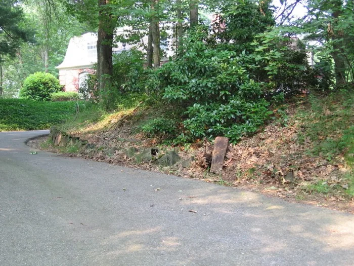 Property before stone retaining wall